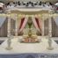 "Traditional Indian Wedding Fiber Carved Mandap Setup in ivory beige color with carved fiber pillars and canopy, designed for Hindu marriage ceremonies."
