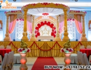 golden round wedding mandap, traditional Indian mandap, royal Hindu wedding stage, fiber carved mandap, luxury wedding décor, DST Exports mandap, golden pillar mandap, round shape mandap design, Indian wedding stage setup, traditional wedding mandap, handcrafted wedding stage, golden mandap for marriage, destination wedding décor, Hindu mandap manufacturer, elegant Indian mandap design