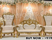 wedding sofa set, royal stage sofa, maharaja wedding furniture, luxury wedding seating, golden carved sofa, DST Exports wedding stage, wedding thrones for bride and groom, antique gold sofa set, Indian wedding decor furniture, baroque style wedding sofa, elegant wedding stage seating, traditional wedding furniture, handcrafted wooden sofa set, royal Indian wedding decor